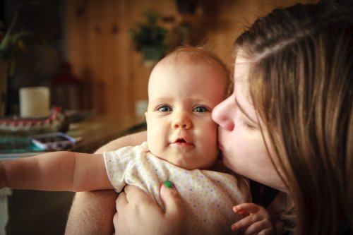 Sonja gets a kiss from Mama